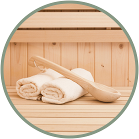Sauna Icon - Spoon on towels on bench